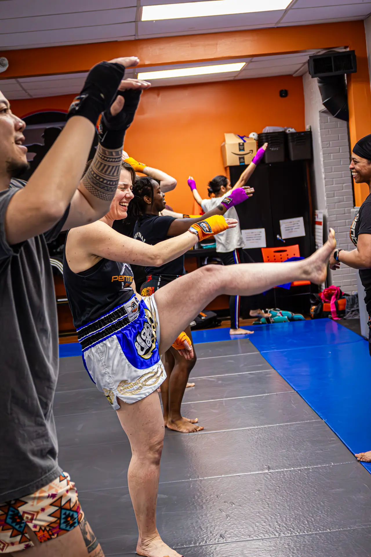 Our adult Muay Thai training offers a full-body workout rooted in Thailand’s national sport, combining ancient martial arts, modern training routines, and powerful self-defense techniques to help you get in the best shape of your life.